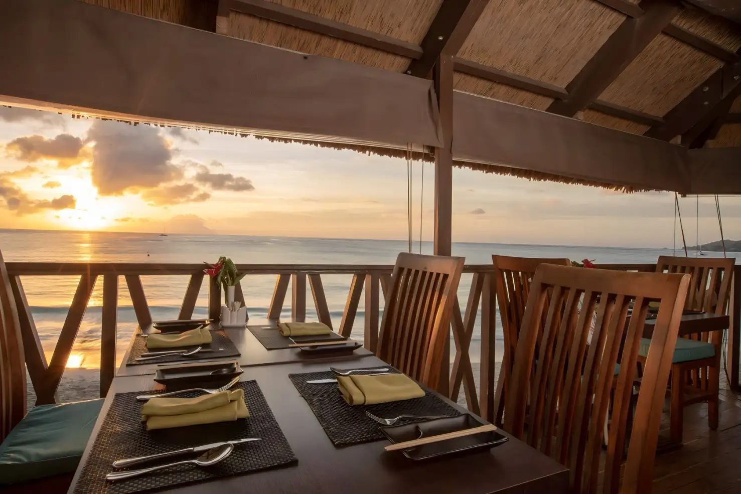 Savor Exquisite Japanese Cuisine with Breathtaking Ocean Views at Coral Asia Restaurant.