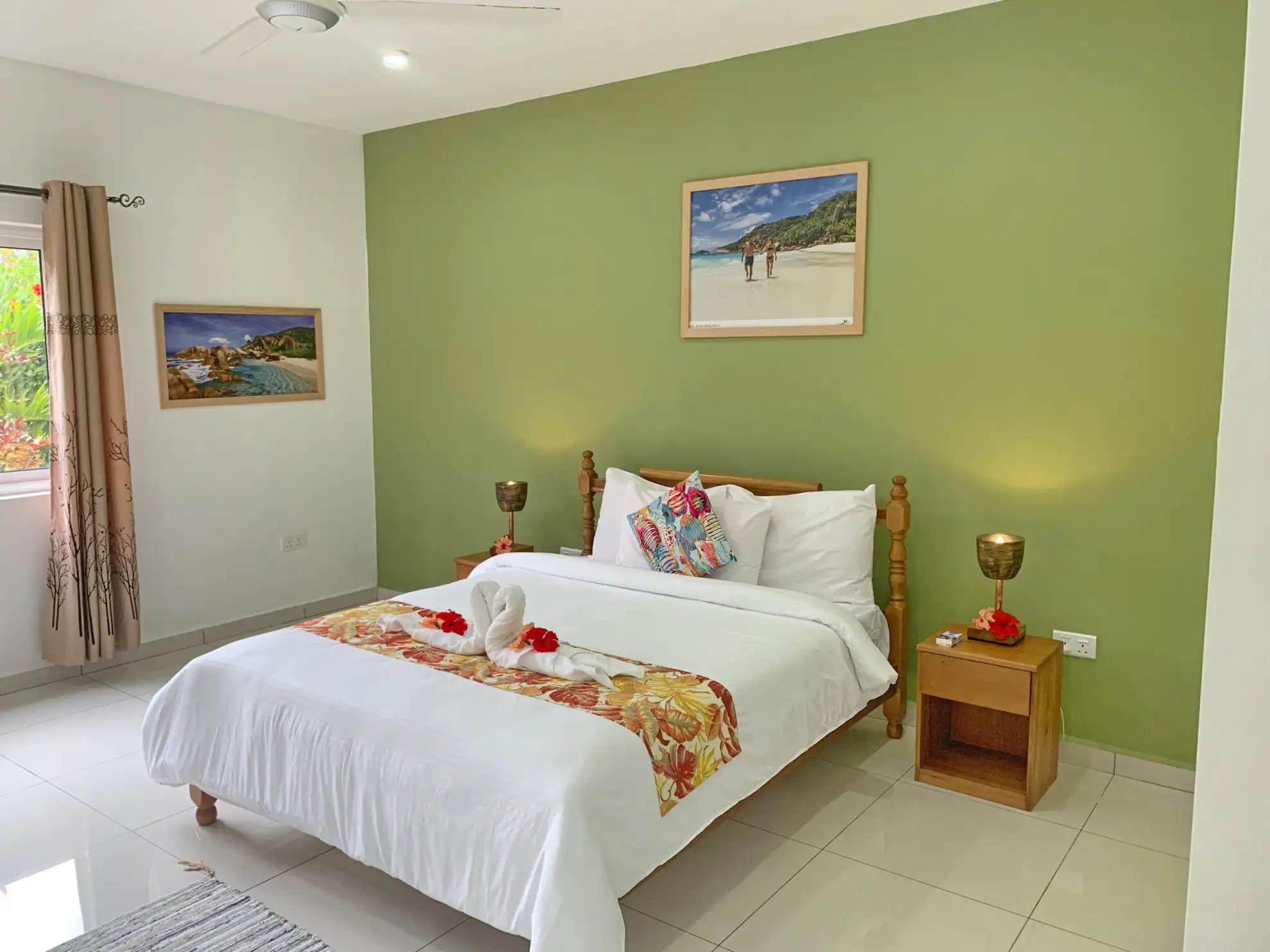Escape to The Seaboards Apartments, nestled within a vibrant garden adorned with lush flowers and trees, on the breathtaking southwest of Mahe Island.
